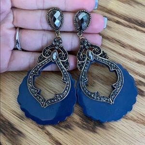 Blue diamond earrings.